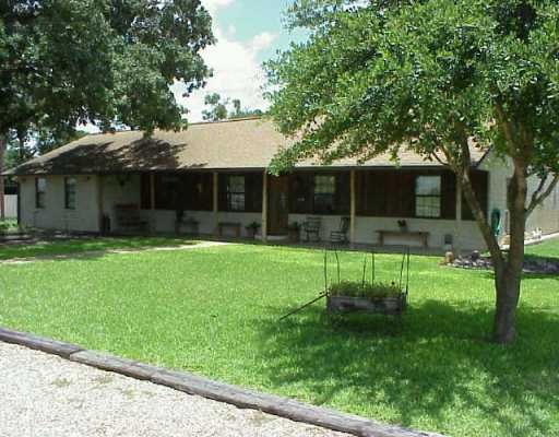 18208 Lockwood Road Manor, TX 78653 - Photo 1 of 1 a view of house with backyard