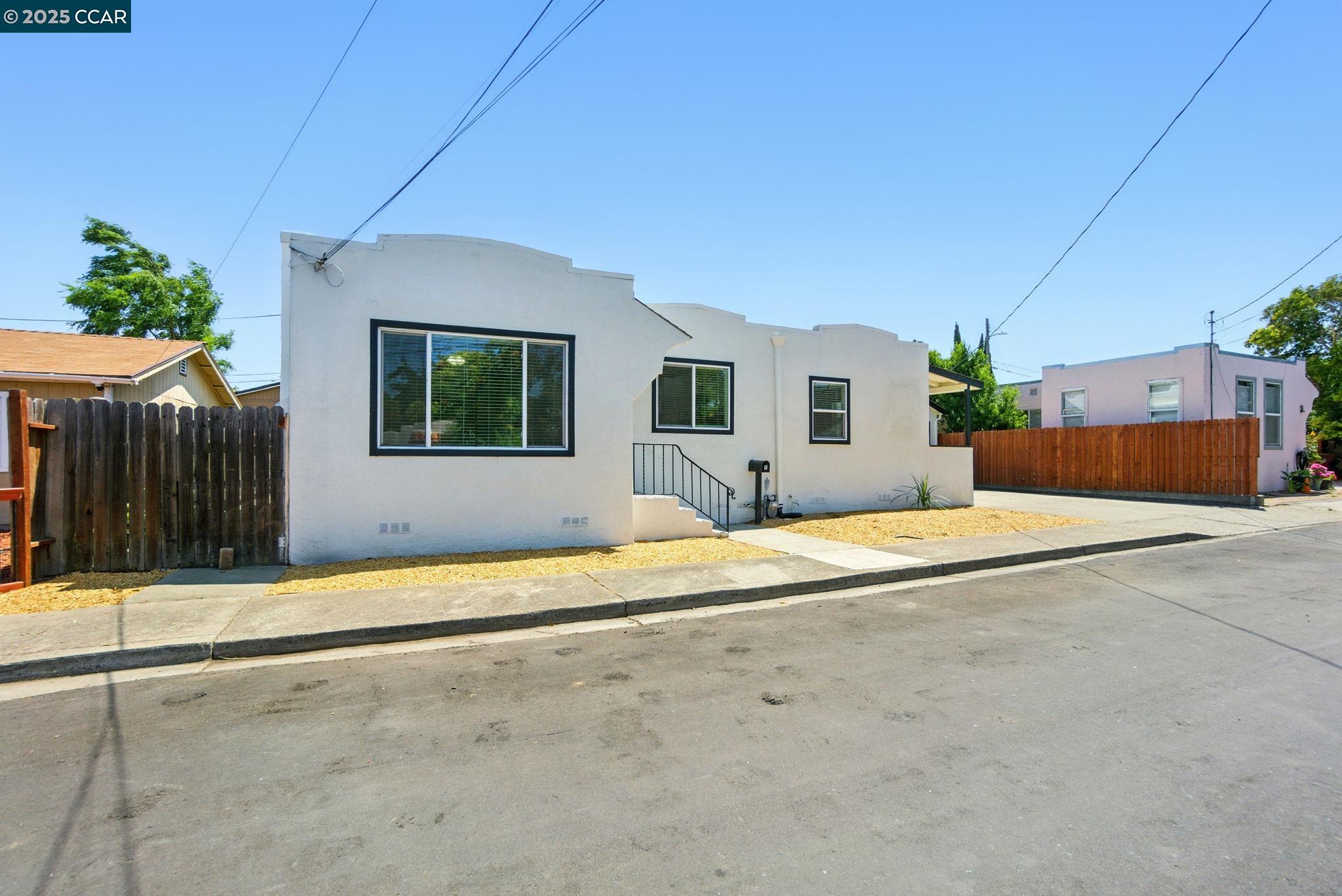 35 Rose Avenue Bay Point, CA 94565 - Photo 1 of 1 a view of a house with a backyard and a garage