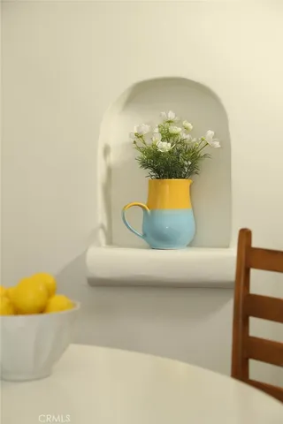 a vase of flowers sitting on a table