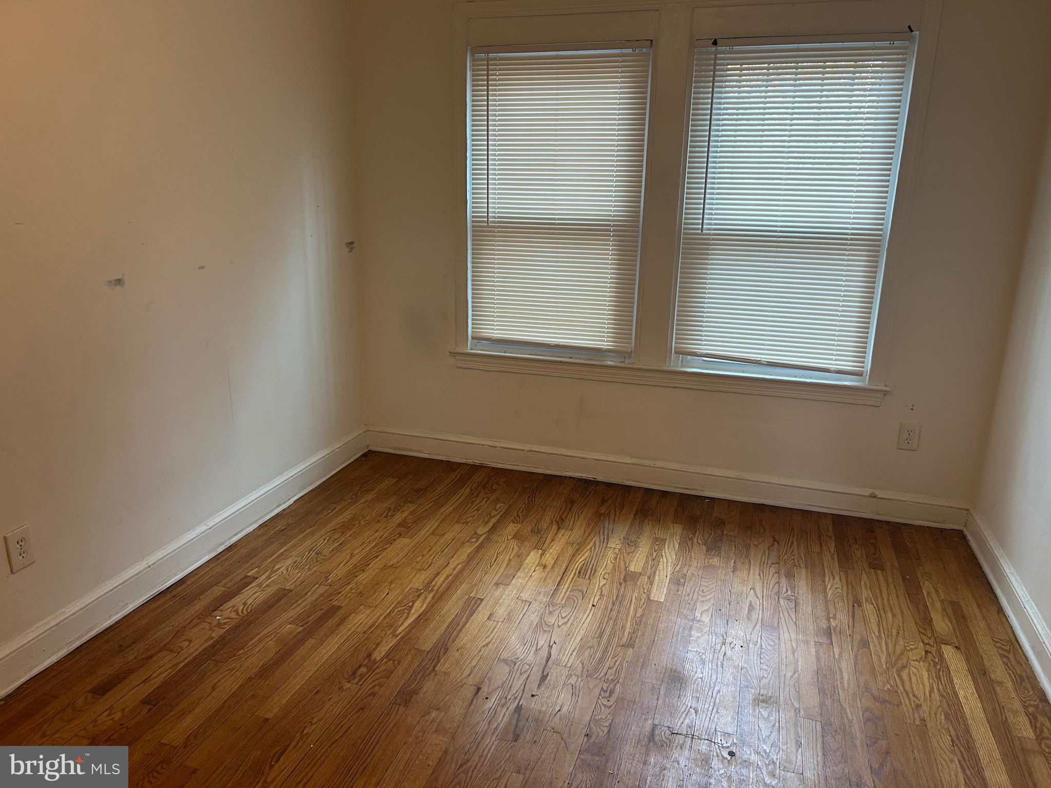 331 Parkland Place Southeast Washington, DC 20032 - Photo 8 of 8 an empty room with a window