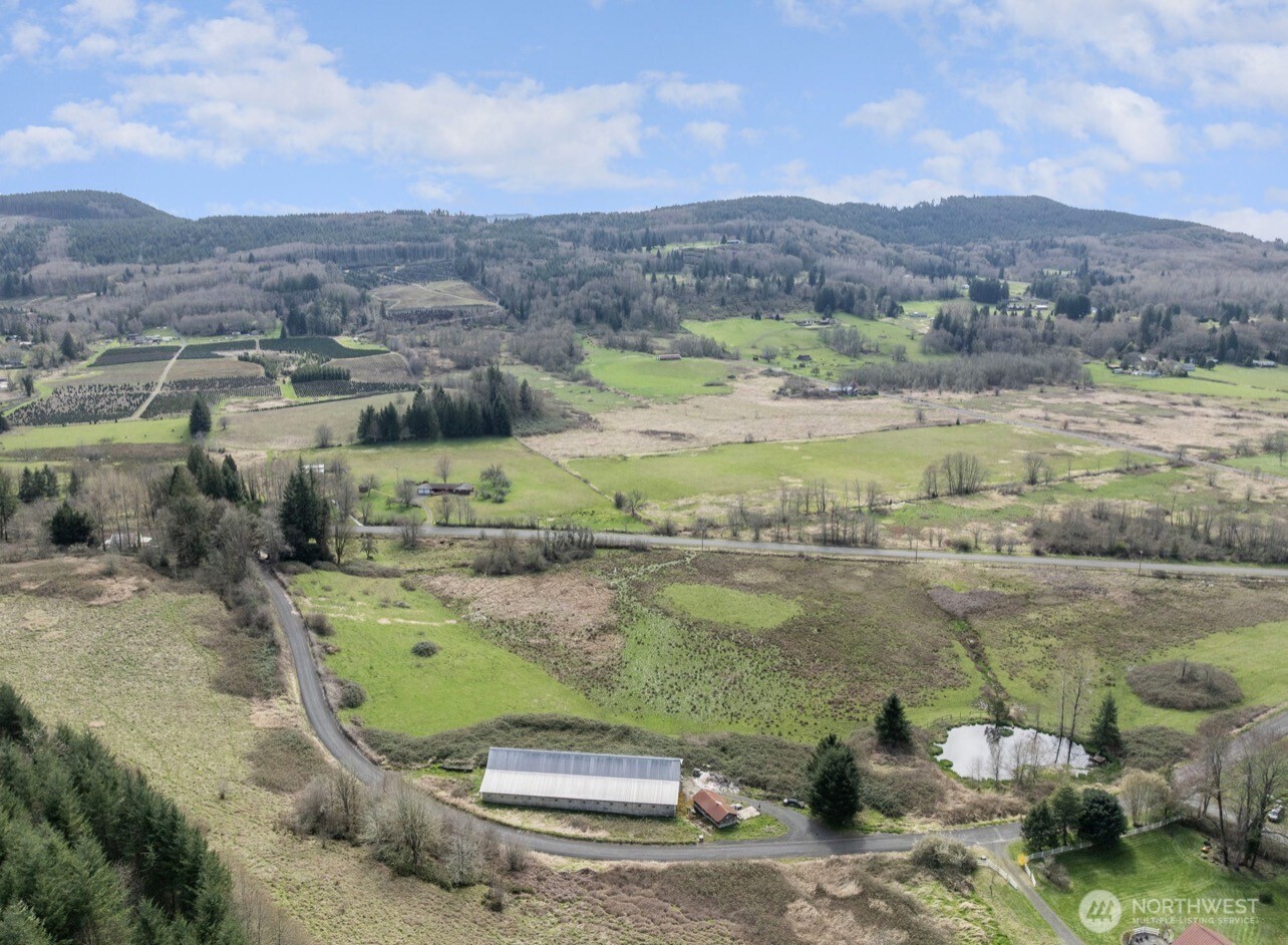 284 Jarvis Road Mossyrock, WA 98564 - Photo 4 of 6 a view of a lake with a mountain