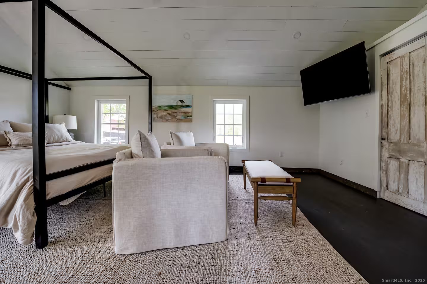 740 Little City Road Haddam, CT 06441 - Photo 17 of 21 a living room with furniture and a flat screen tv