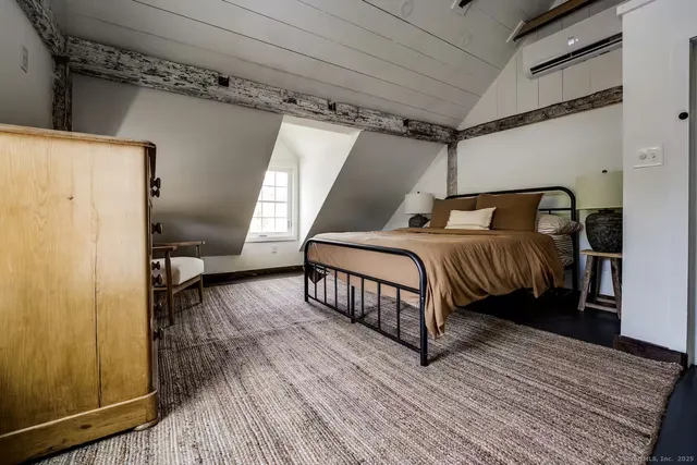 a bathroom with a bathtub and sink