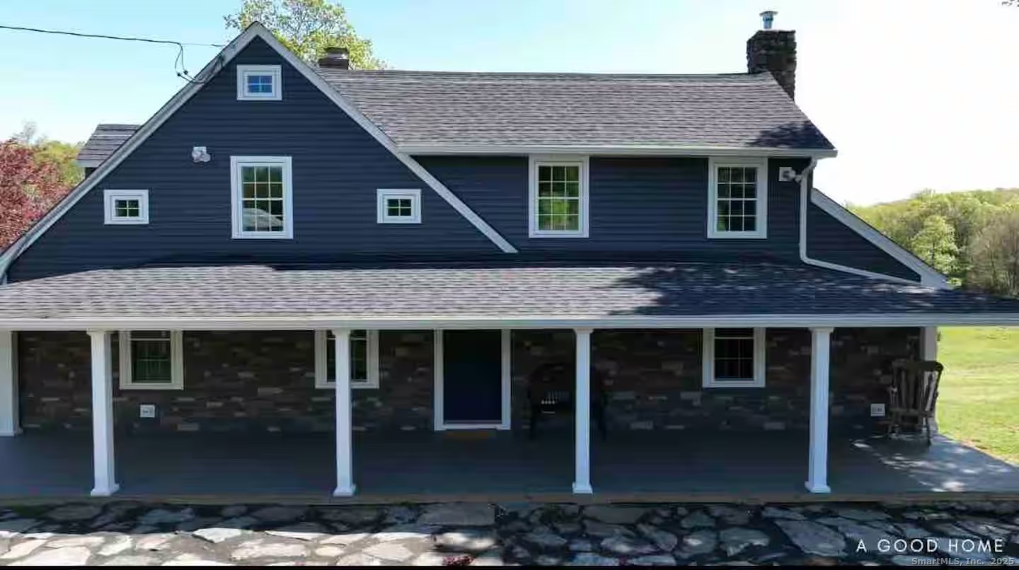 740 Little City Road Haddam, CT 06441 - Photo 20 of 21 a brick house with front of a house