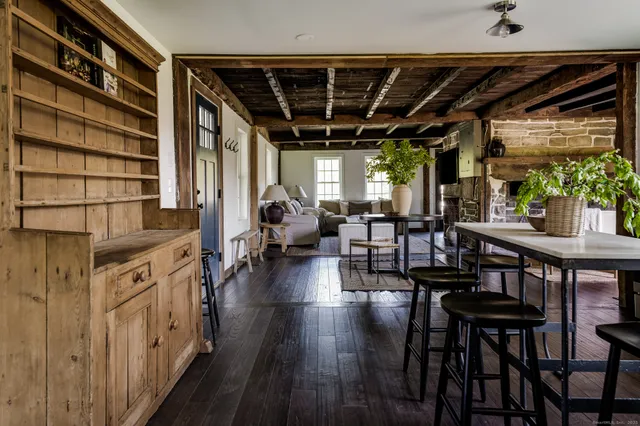 a view of a dining room with furniture window and outside view