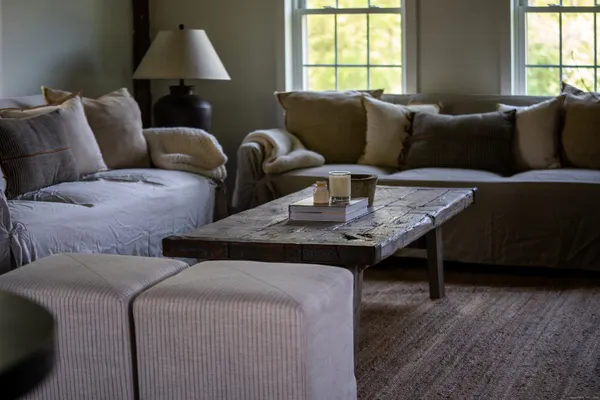 a bathroom with a toilet a sink and a mirror