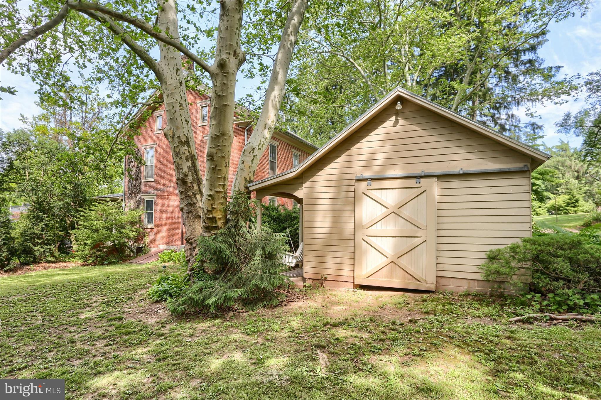 5531 Spring Road Shermans Dale, PA 17090 - Photo 54 of 76 Storage shed for lawn equipment.