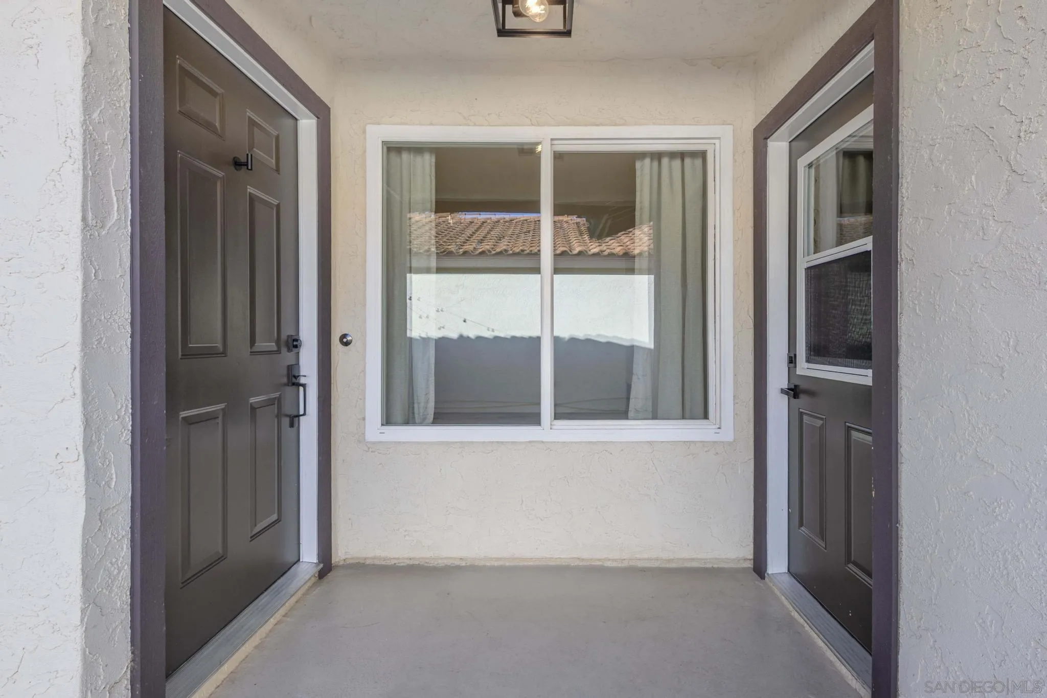 4733 Dalea Place Oceanside, CA 92057 - Photo 6 of 30 wooden floor and window in a room