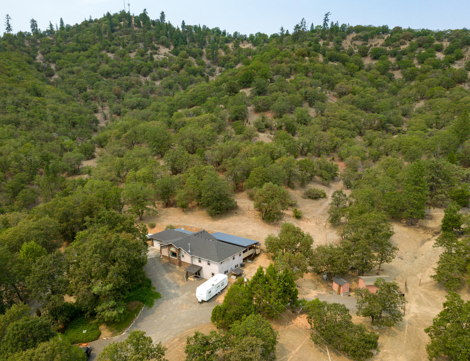 9996 Blackwell Road Central Point, OR 97502 - Photo 35 of 46 an aerial view of a house with mountain view