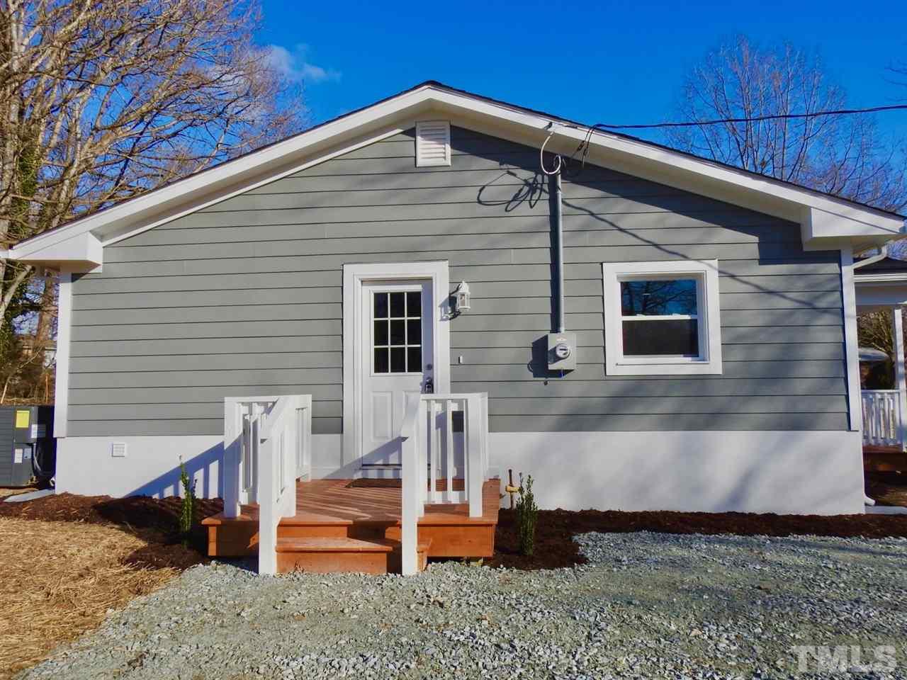 41 Peace Street Roxboro, NC 27573 - Photo 3 of 20 a front view of a house with a yard