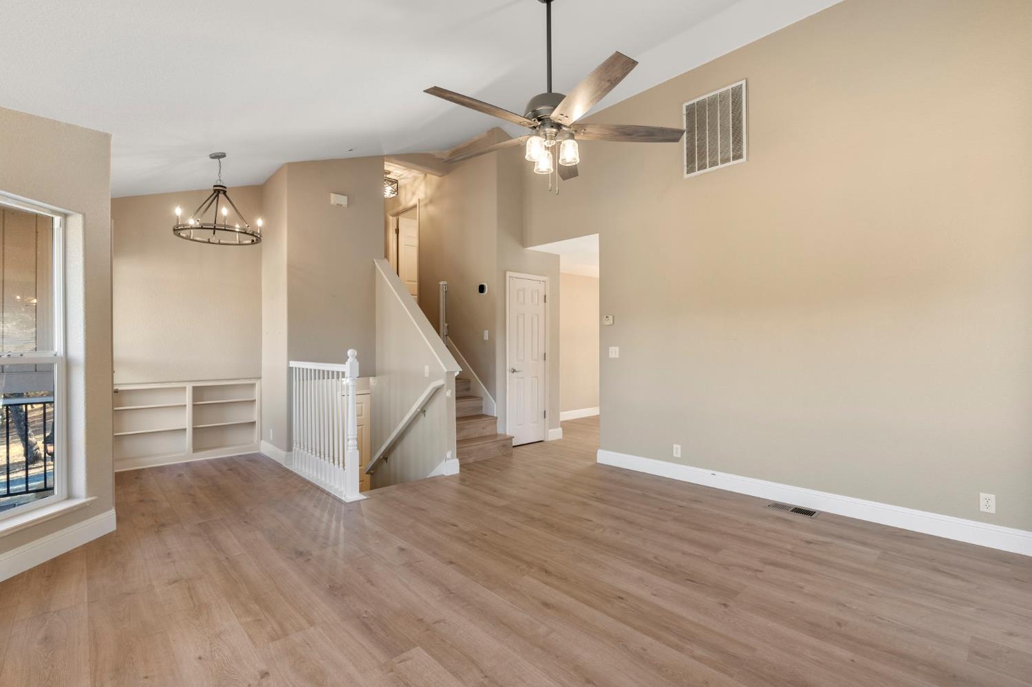 4068 Little John Road Copperopolis, CA 95228 - Photo 19 of 50 wooden floor in an empty room with a window