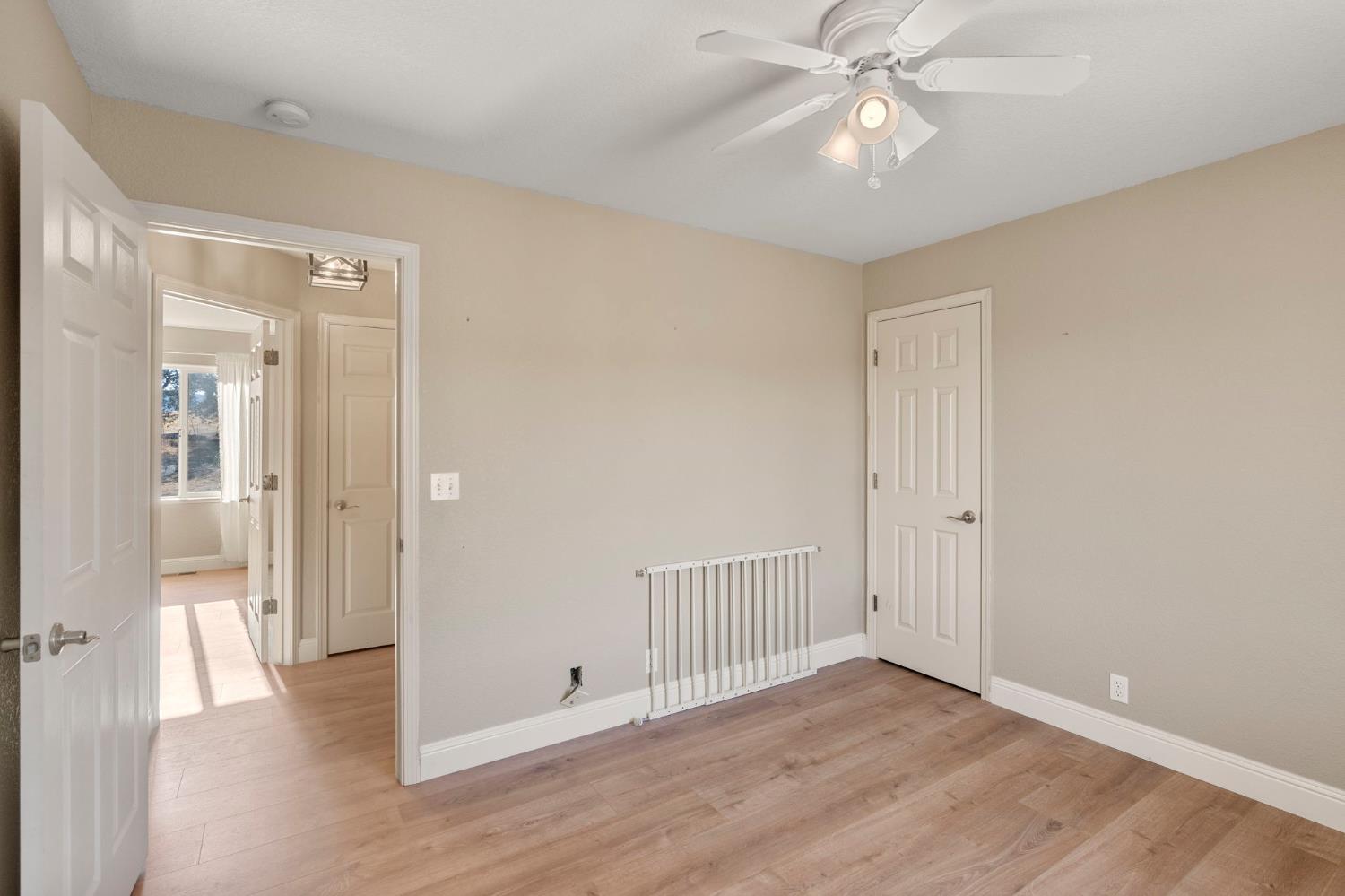 4068 Little John Road Copperopolis, CA 95228 - Photo 29 of 50 wooden floor in an empty room