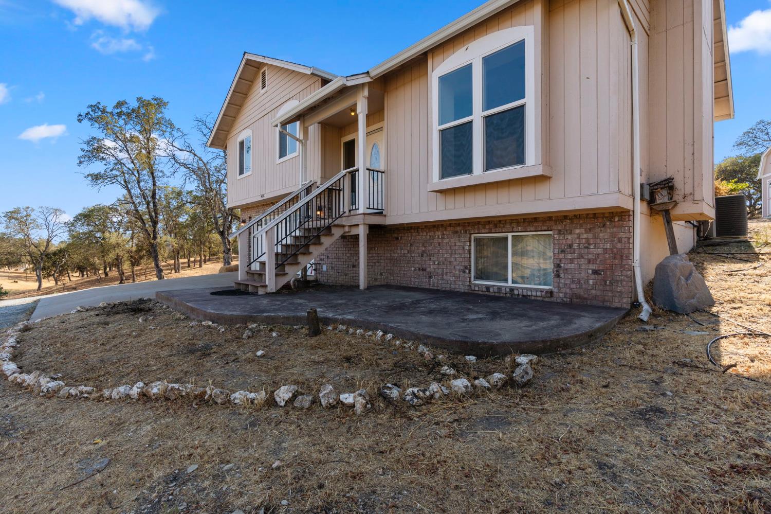 4068 Little John Road Copperopolis, CA 95228 - Photo 3 of 46 a view of a house with a yard