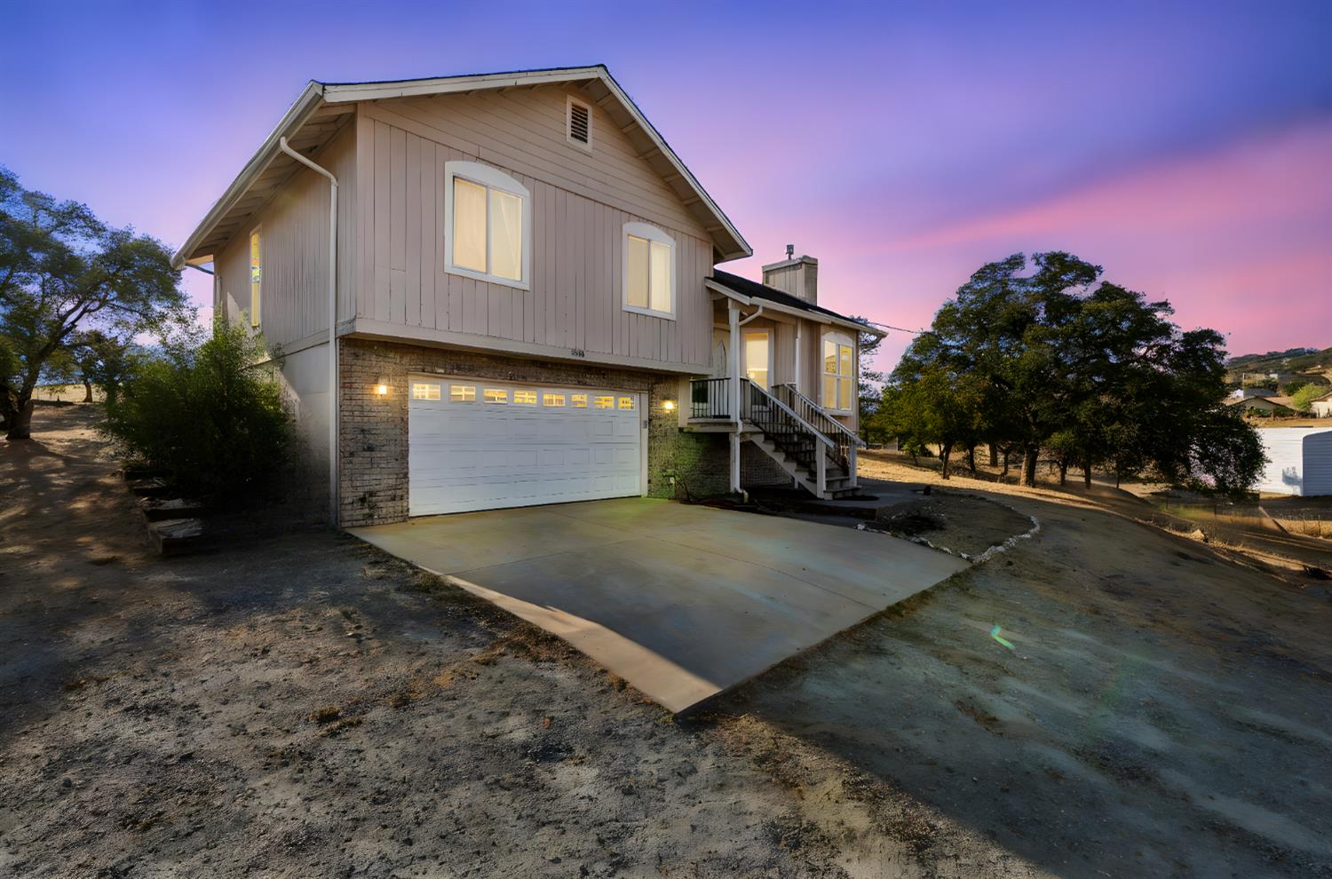 4068 Little John Road Copperopolis, CA 95228 - Photo 4 of 50 a front view of a house with a yard