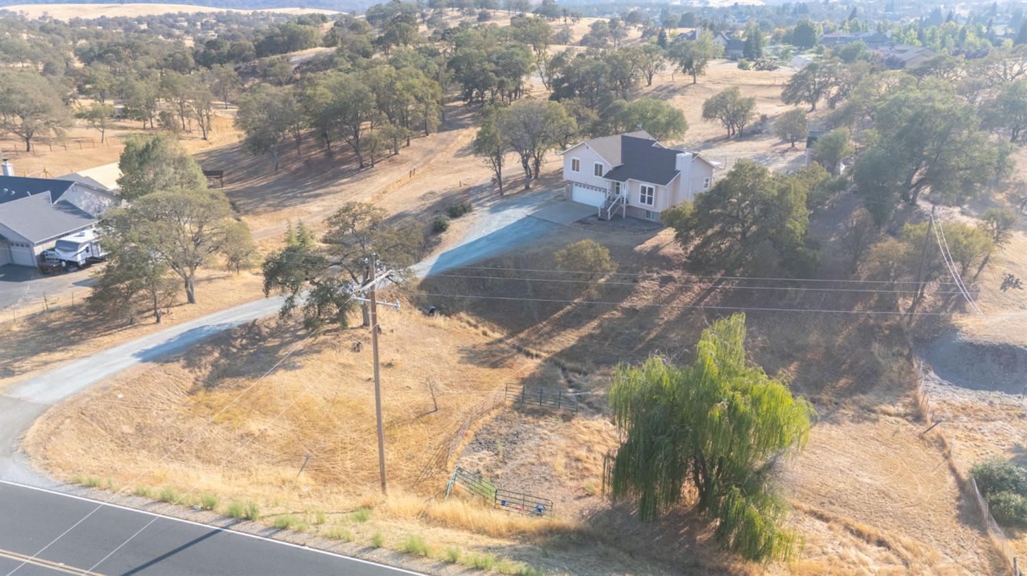 4068 Little John Road Copperopolis, CA 95228 - Photo 7 of 46 a city view of a yard