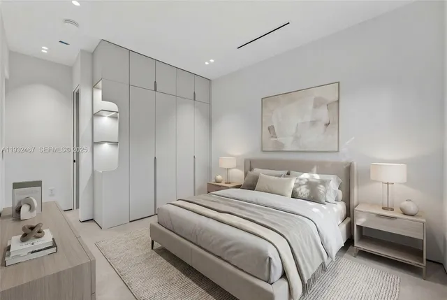 a bedroom with a bed and a walk in closet