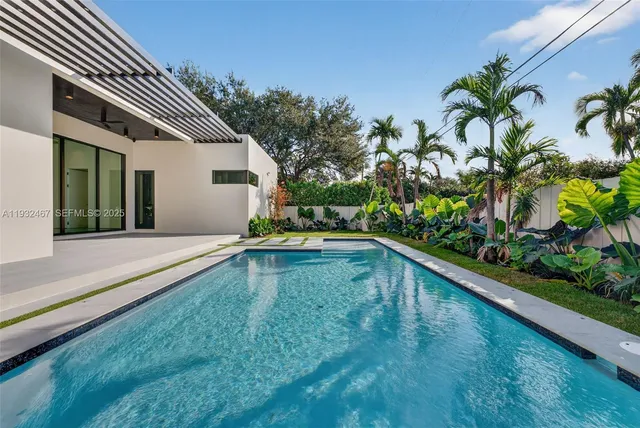 a view of a backyard with a garden