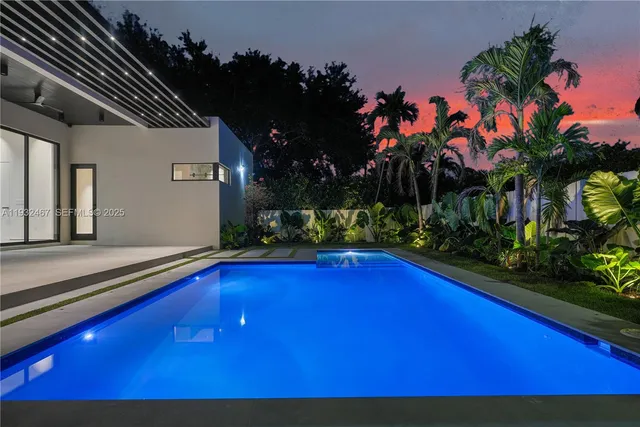 a view of swimming pool in a yard