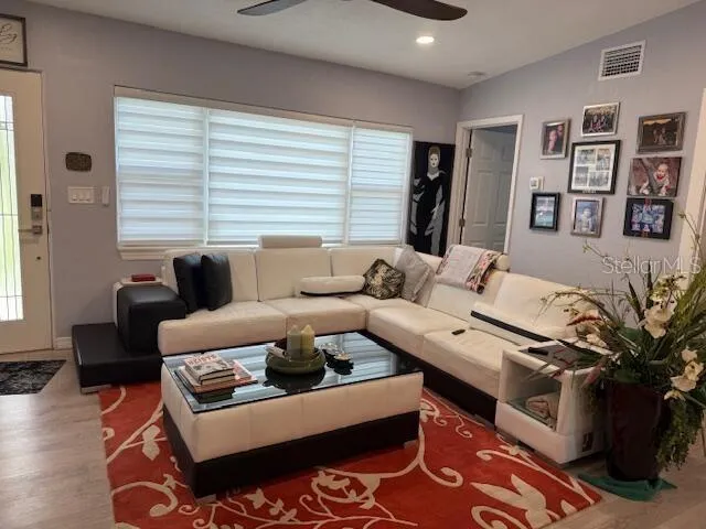 a living room with furniture and a couch