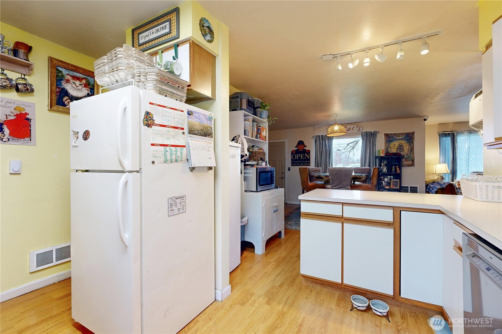 530 Southwest 4th Street College Place, WA 99324 - Photo 13 of 31 a kitchen with a refrigerator a stove and cabinets