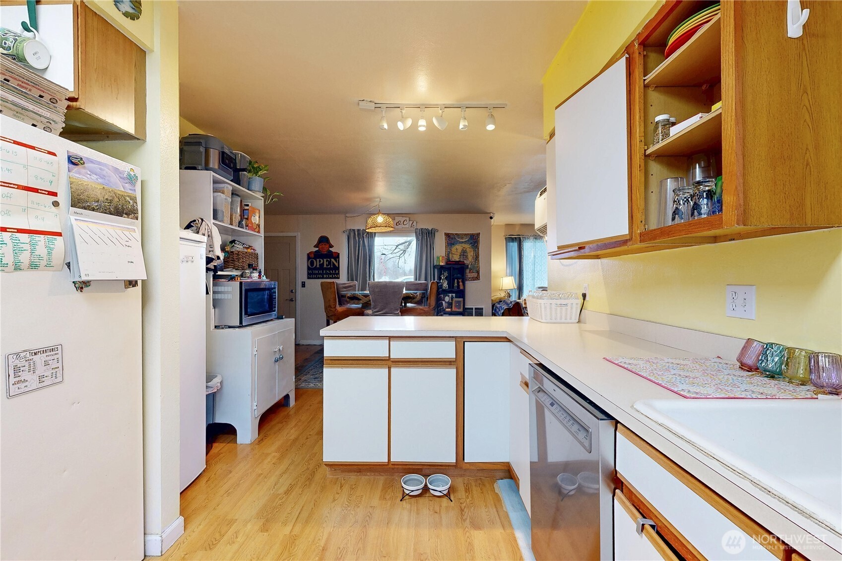 530 Southwest 4th Street College Place, WA 99324 - Photo 14 of 31 a kitchen with a sink and cabinets