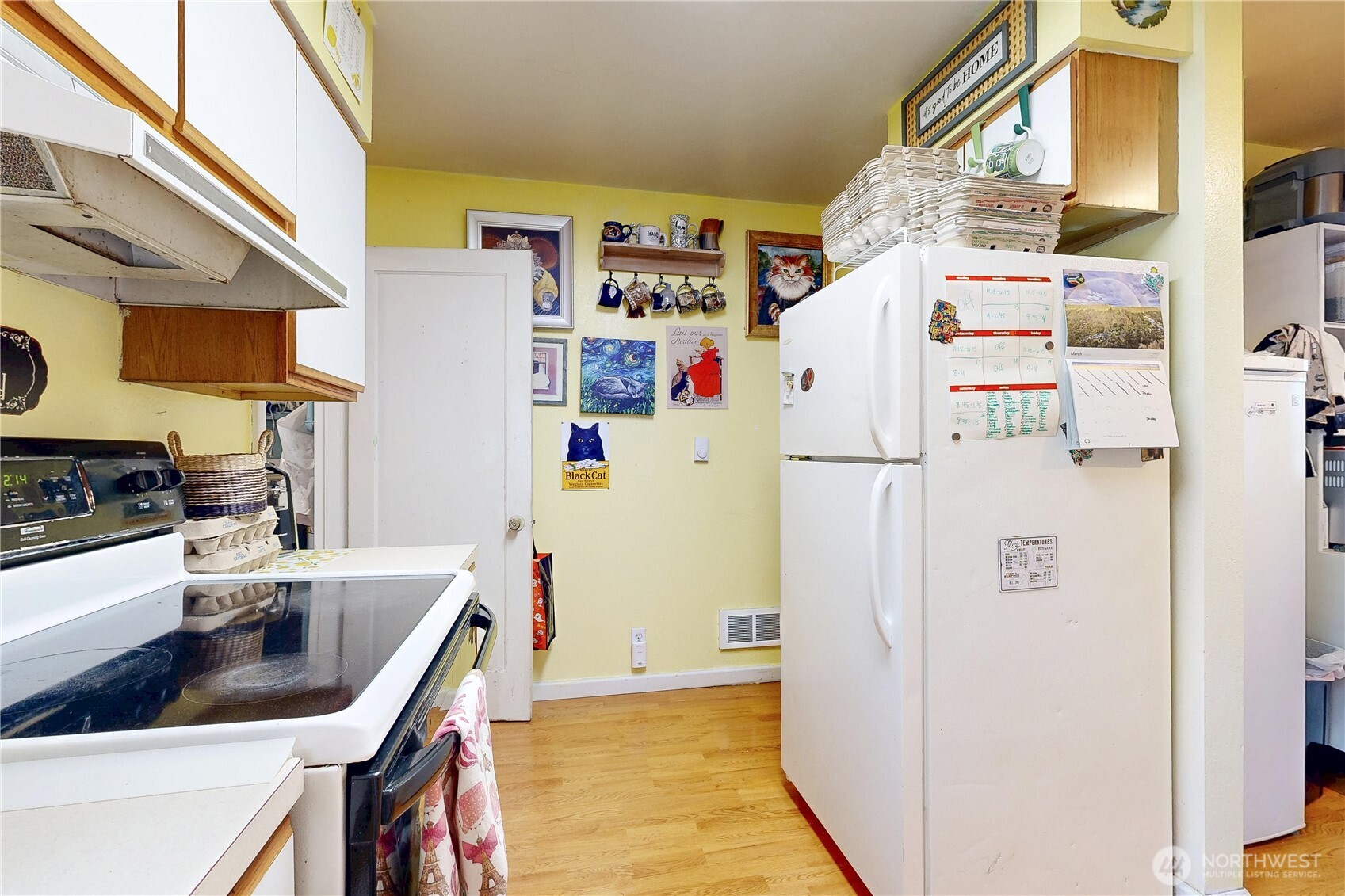 530 Southwest 4th Street College Place, WA 99324 - Photo 15 of 31 a white refrigerator freezer sitting inside of a kitchen