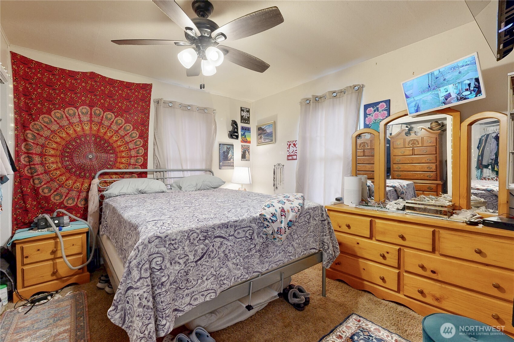530 Southwest 4th Street College Place, WA 99324 - Photo 21 of 30 a bedroom with a bed and wooden floor
