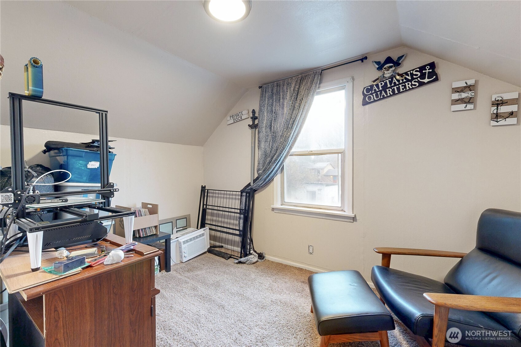530 Southwest 4th Street College Place, WA 99324 - Photo 25 of 30 a view of a workspace with furniture and a window