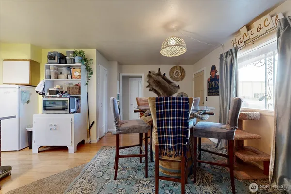 a view of a livingroom with furniture and window