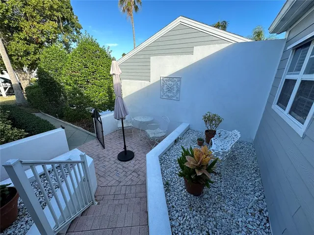 a view of a porch with furniture