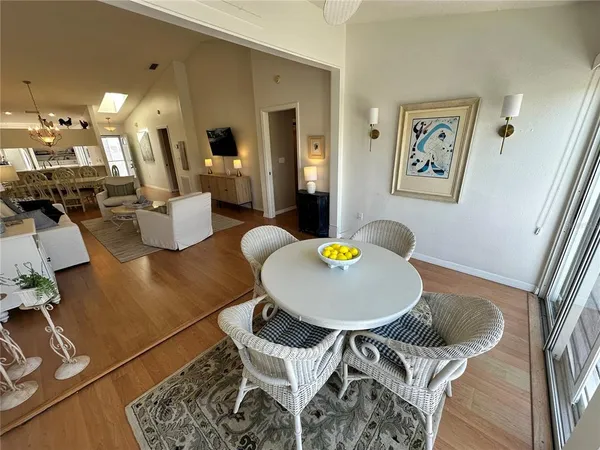 a living room with lots of furniture and a rug