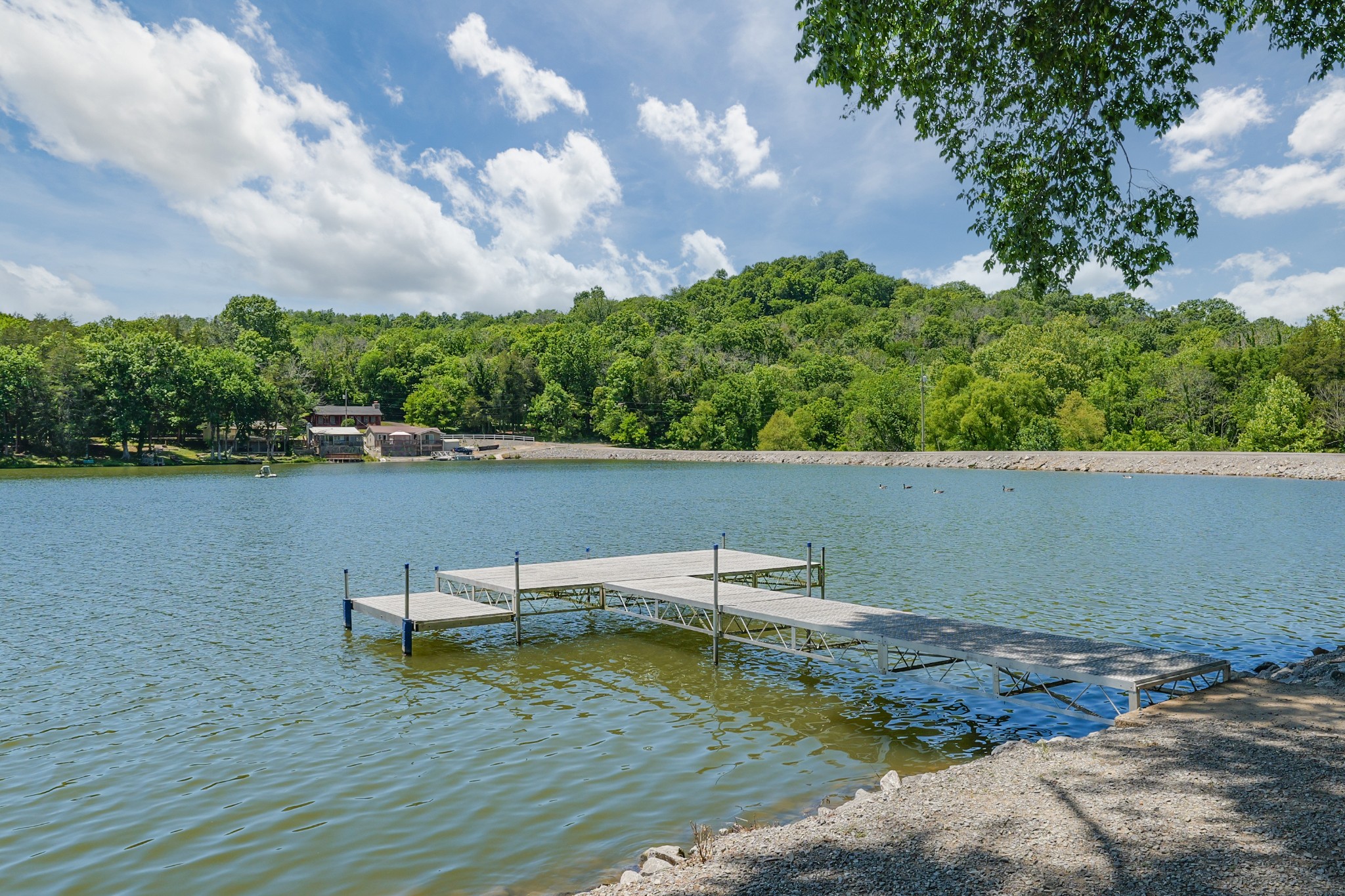 21 Lincoln Lake Road Kelso, TN 37348 - Photo 25 of 26 a view of a lake with lawn chairs