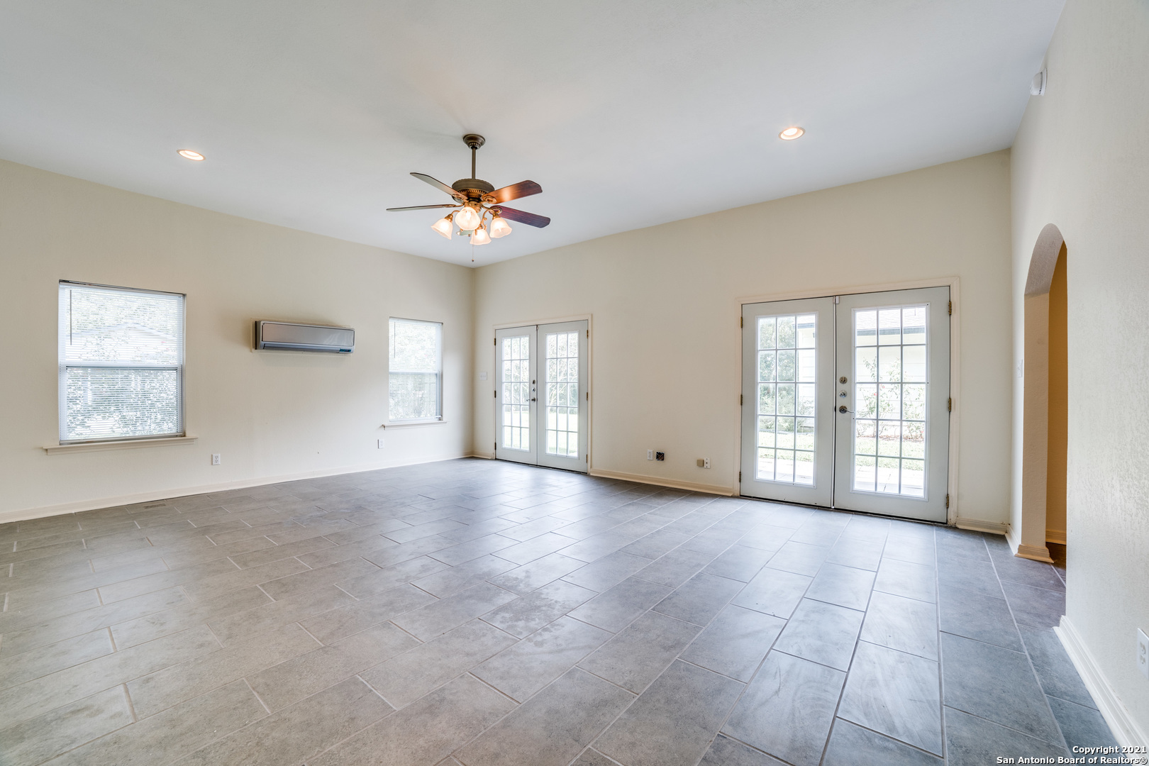 1149 Garraty Road San Antonio, TX 78209 - Photo 13 of 25 a view of an empty room with a window