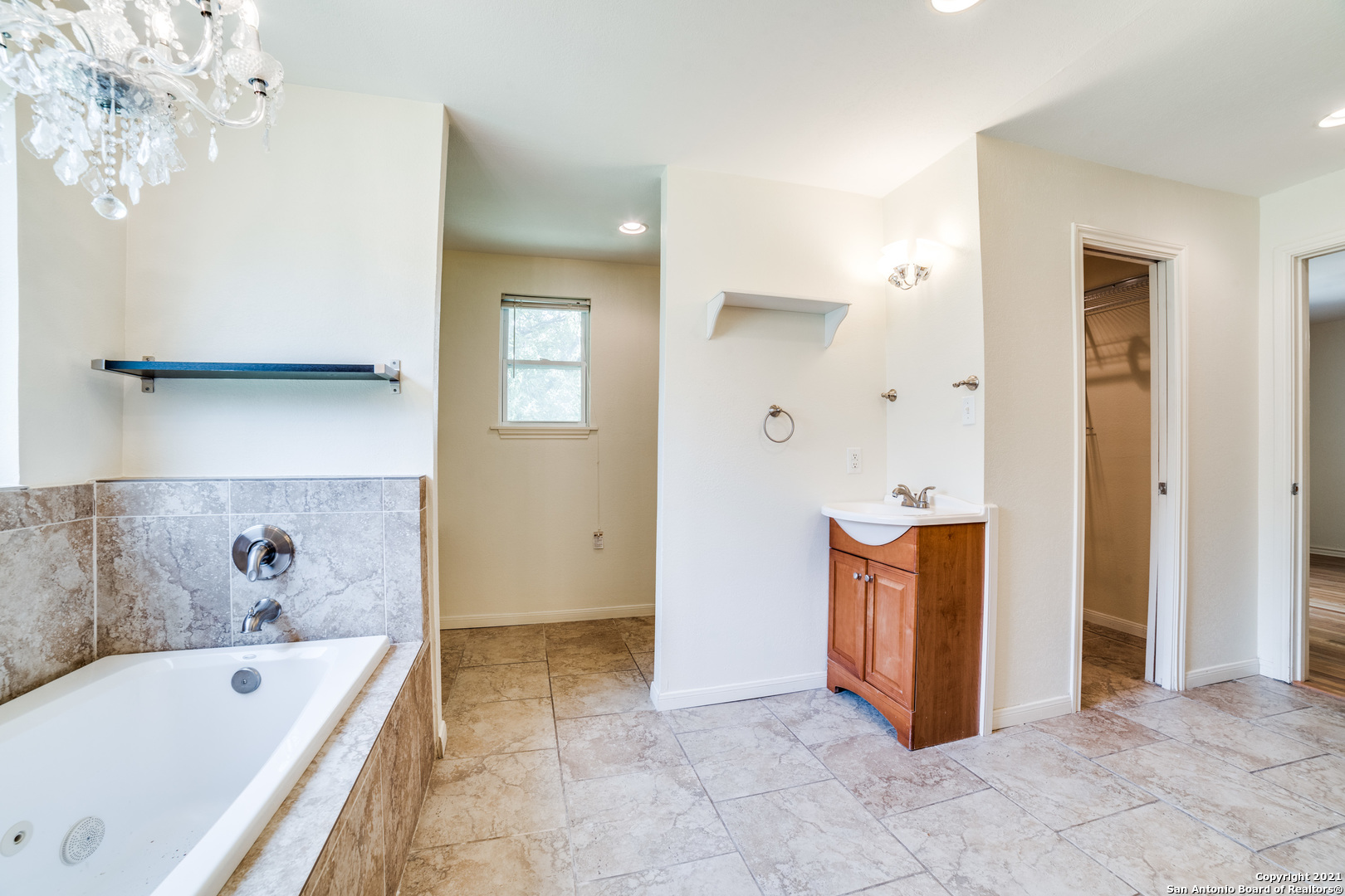 1149 Garraty Road San Antonio, TX 78209 - Photo 22 of 25 a bathroom with a bathtub and a shower