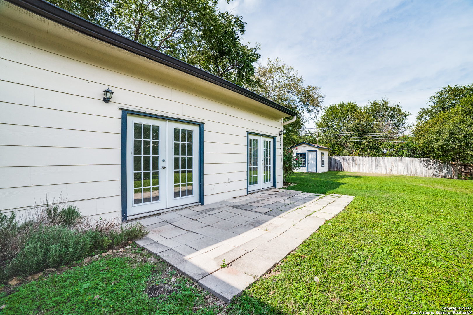 1149 Garraty Road San Antonio, TX 78209 - Photo 23 of 25 a view of a backyard with a garden and plants
