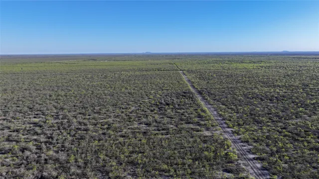 a view of a street with a houses