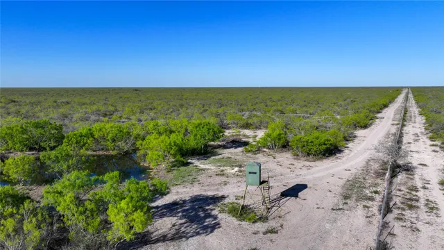 a view of a lake from a yard