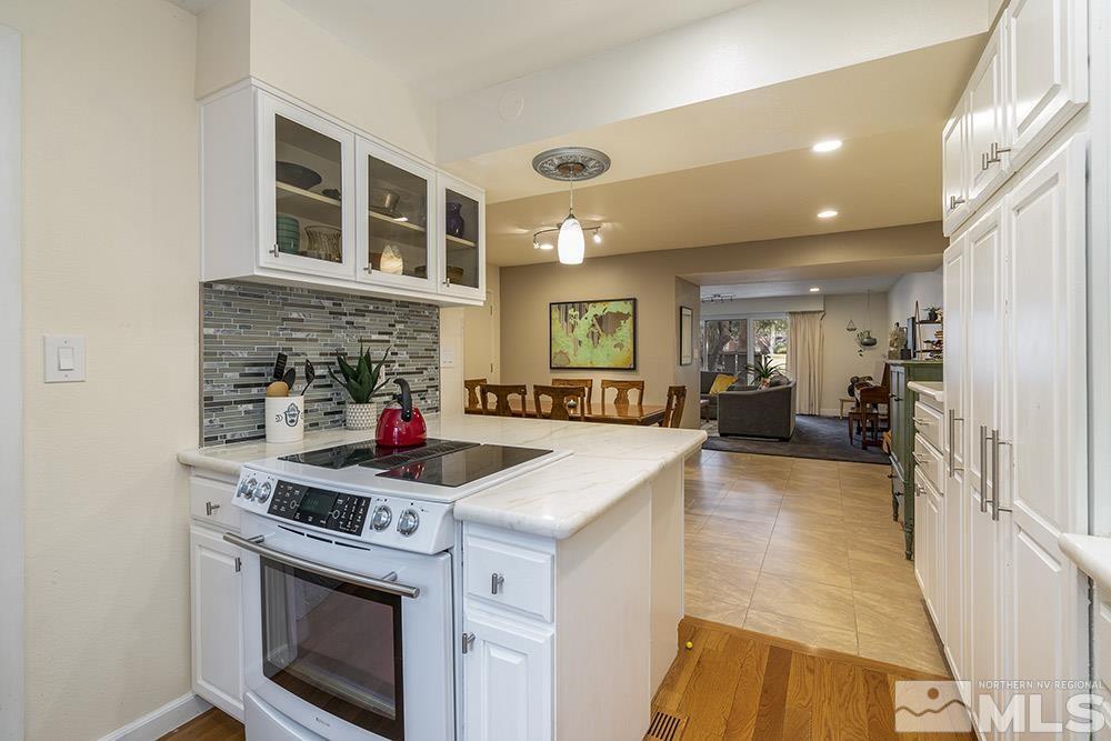 2012 Tremont Lane Reno, NV 89509 - Photo 8 of 20 a kitchen that has a stove and a sink
