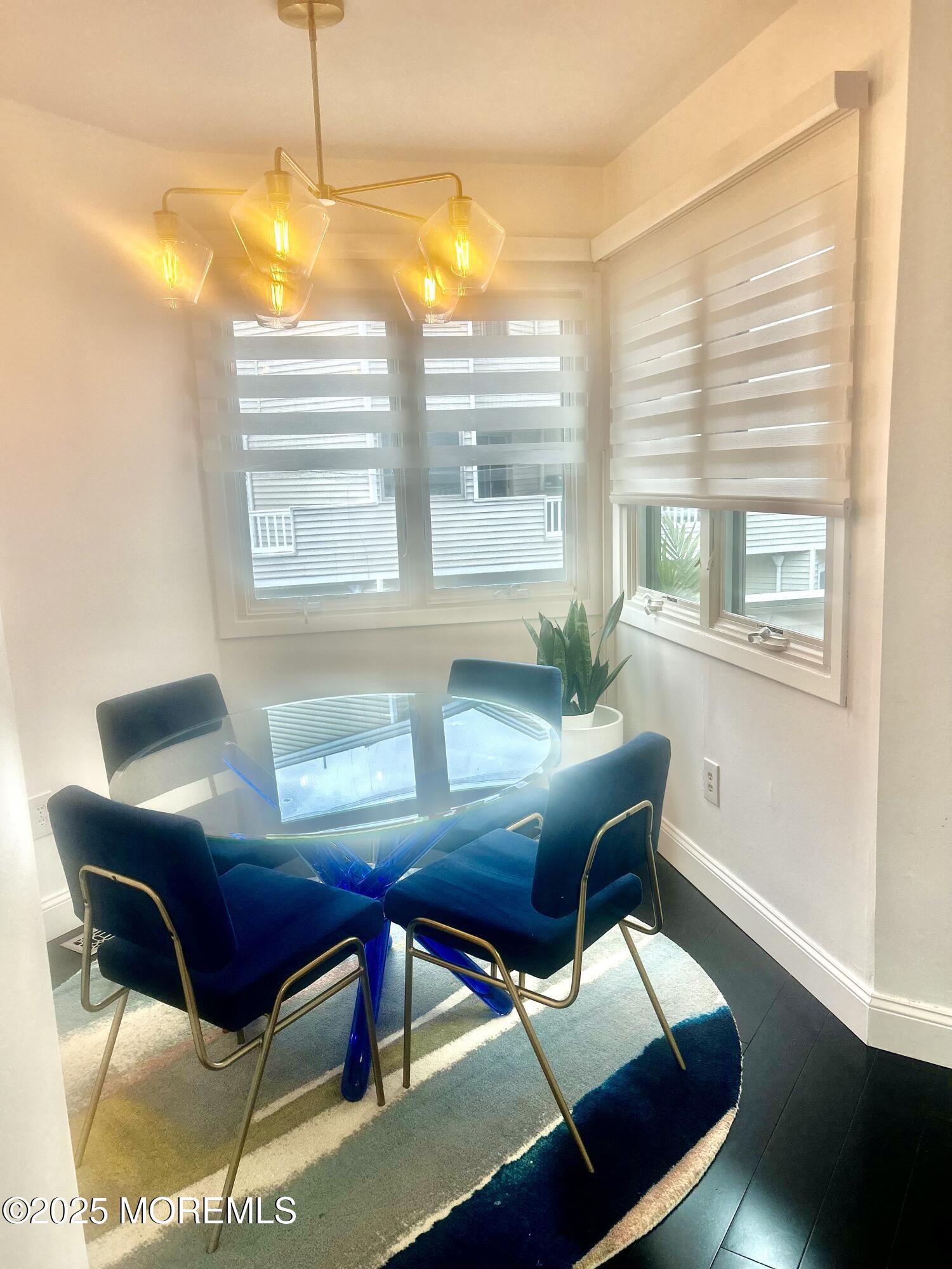 5 Sea Breeze Court Long Branch, NJ 07740 - Photo 15 of 28 a view of a dining room with furniture and a window