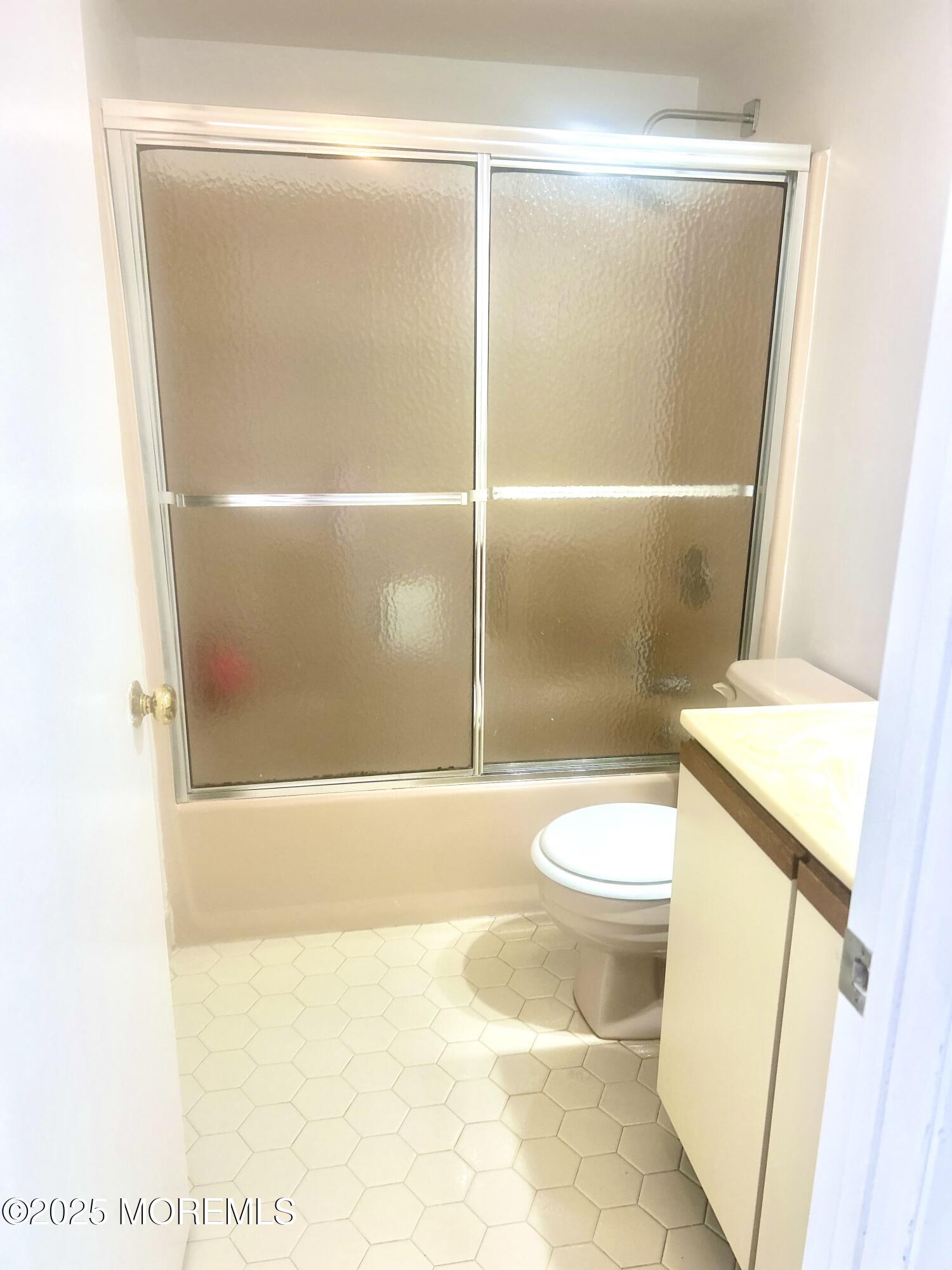 5 Sea Breeze Court Long Branch, NJ 07740 - Photo 18 of 28 a bathroom with a toilet and a shower