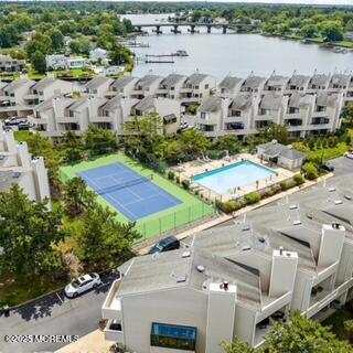 5 Sea Breeze Court Long Branch, NJ 07740 - Photo 3 of 28 a view of multiple houses with yard
