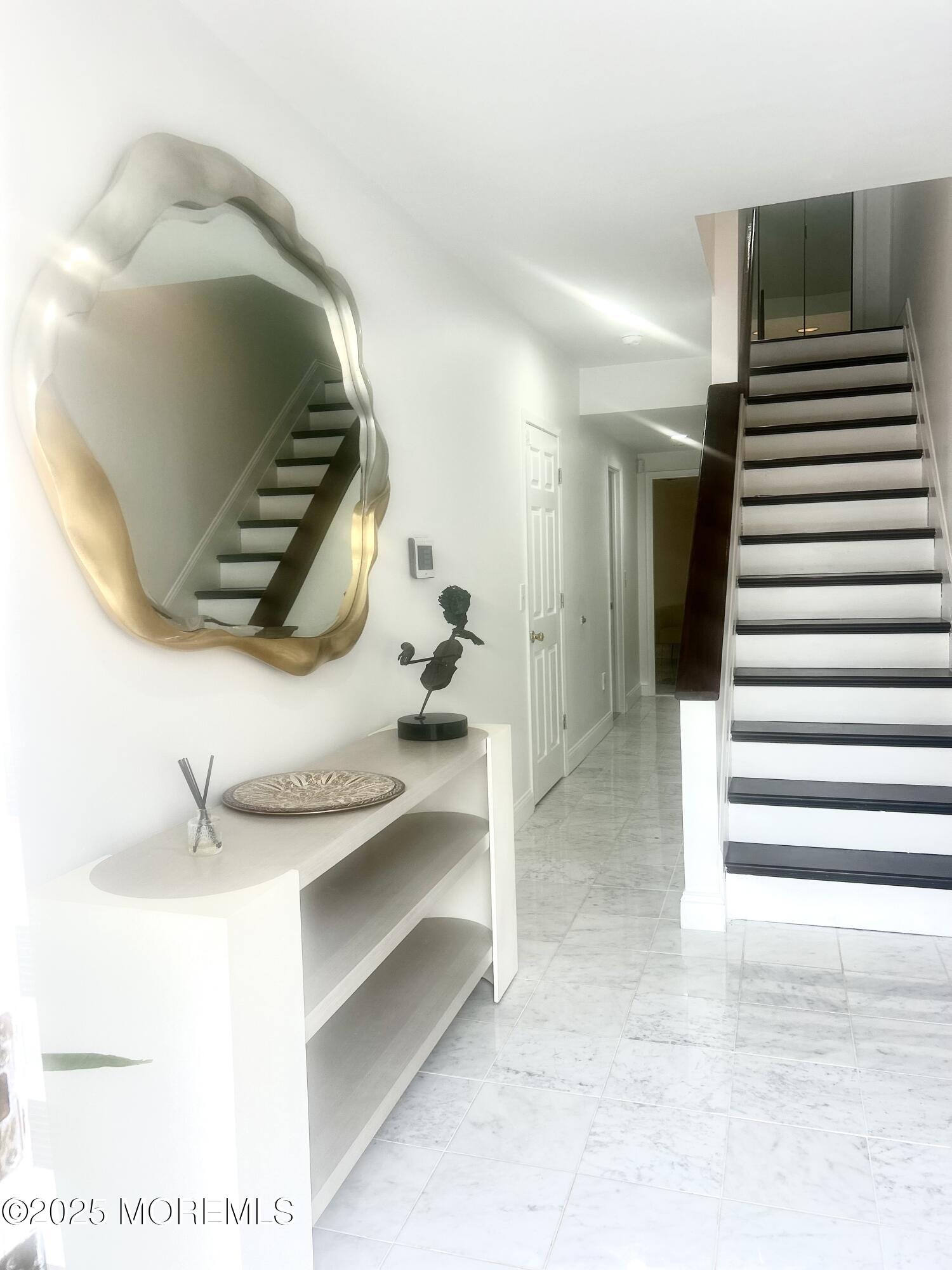 5 Sea Breeze Court Long Branch, NJ 07740 - Photo 4 of 28 a view of a hallway with entryway and wooden floor