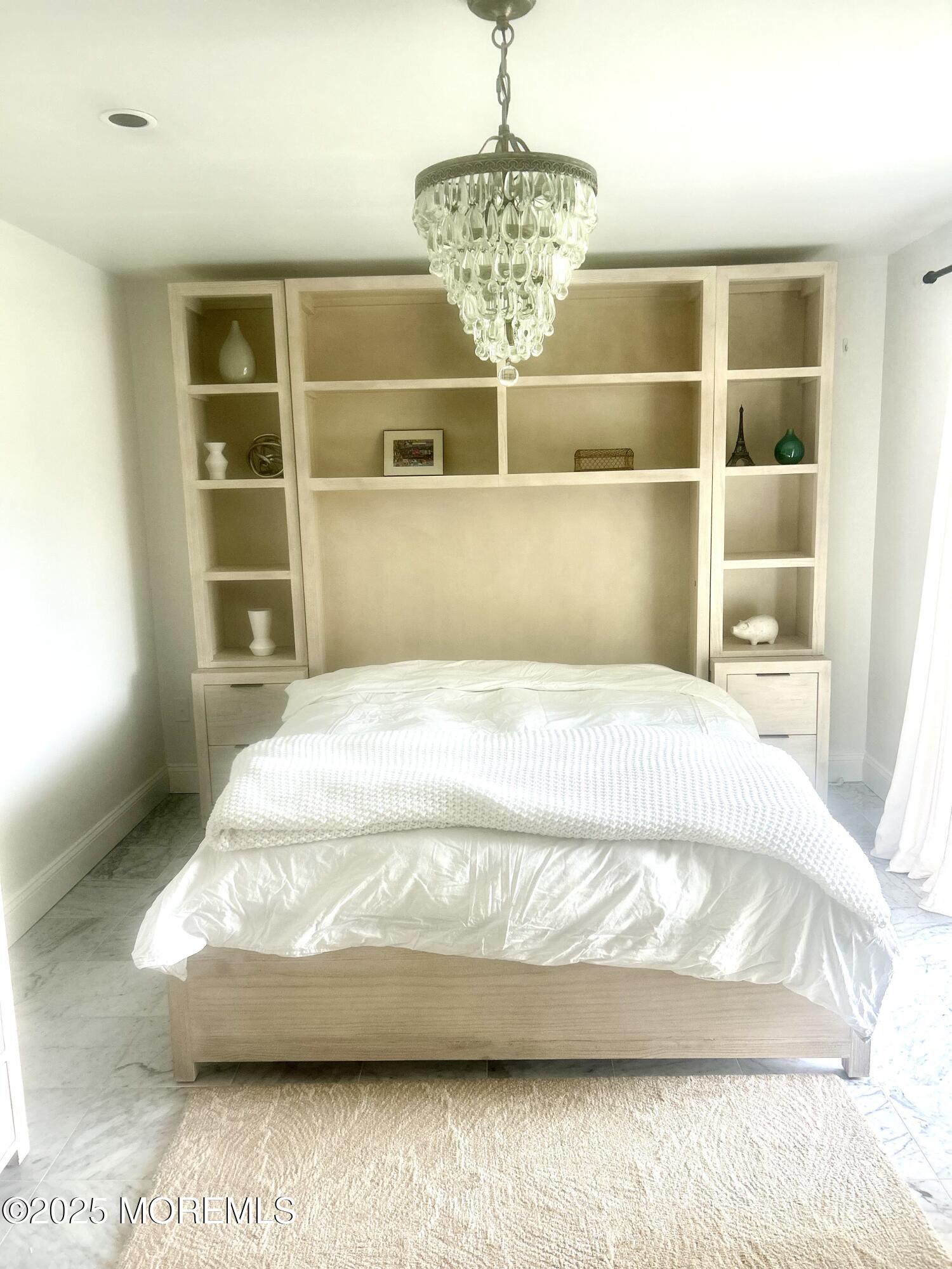 5 Sea Breeze Court Long Branch, NJ 07740 - Photo 6 of 28 a spacious bedroom with a bed and a window