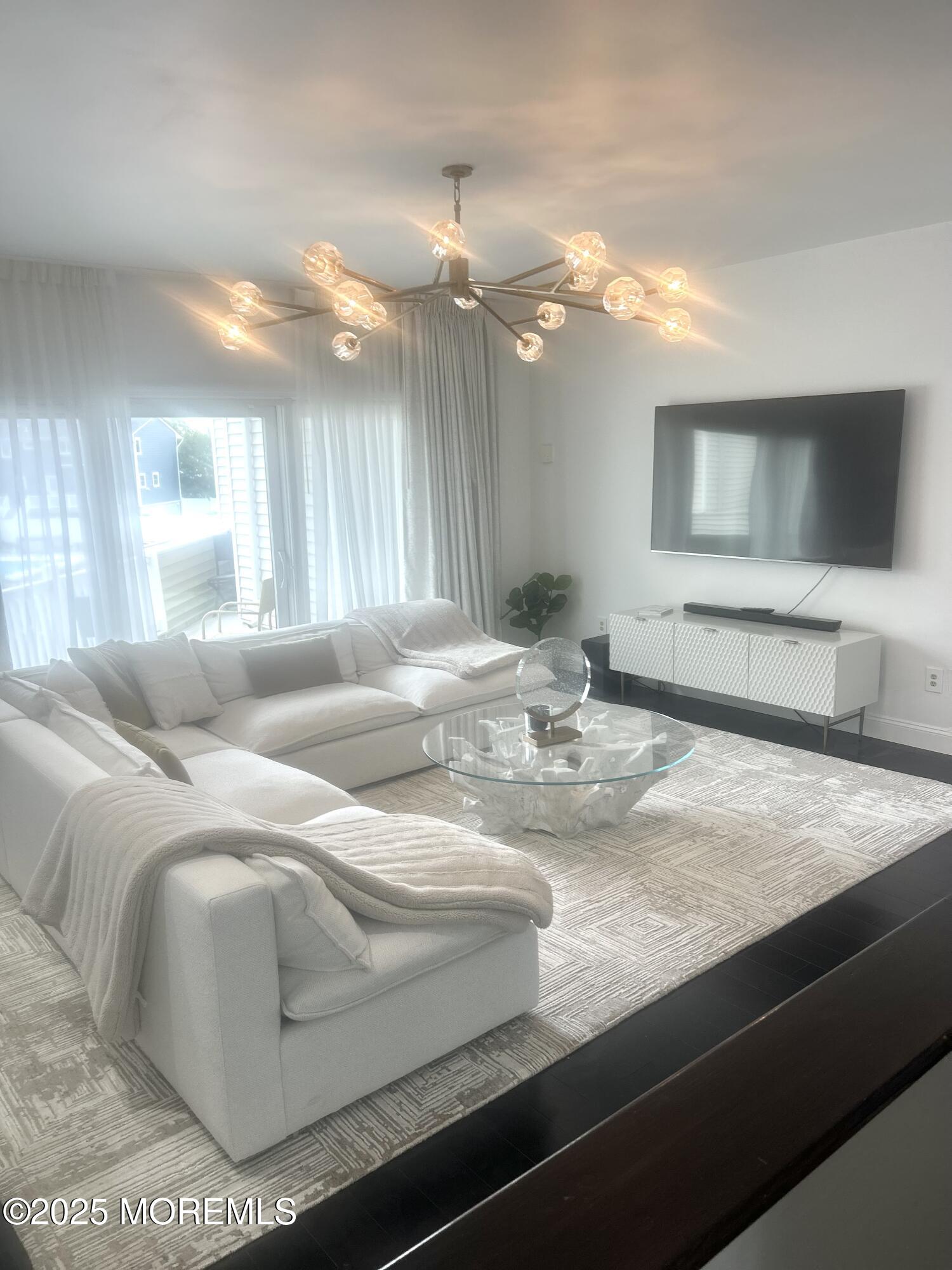 5 Sea Breeze Court Long Branch, NJ 07740 - Photo 10 of 28 a living room with furniture and a flat screen tv