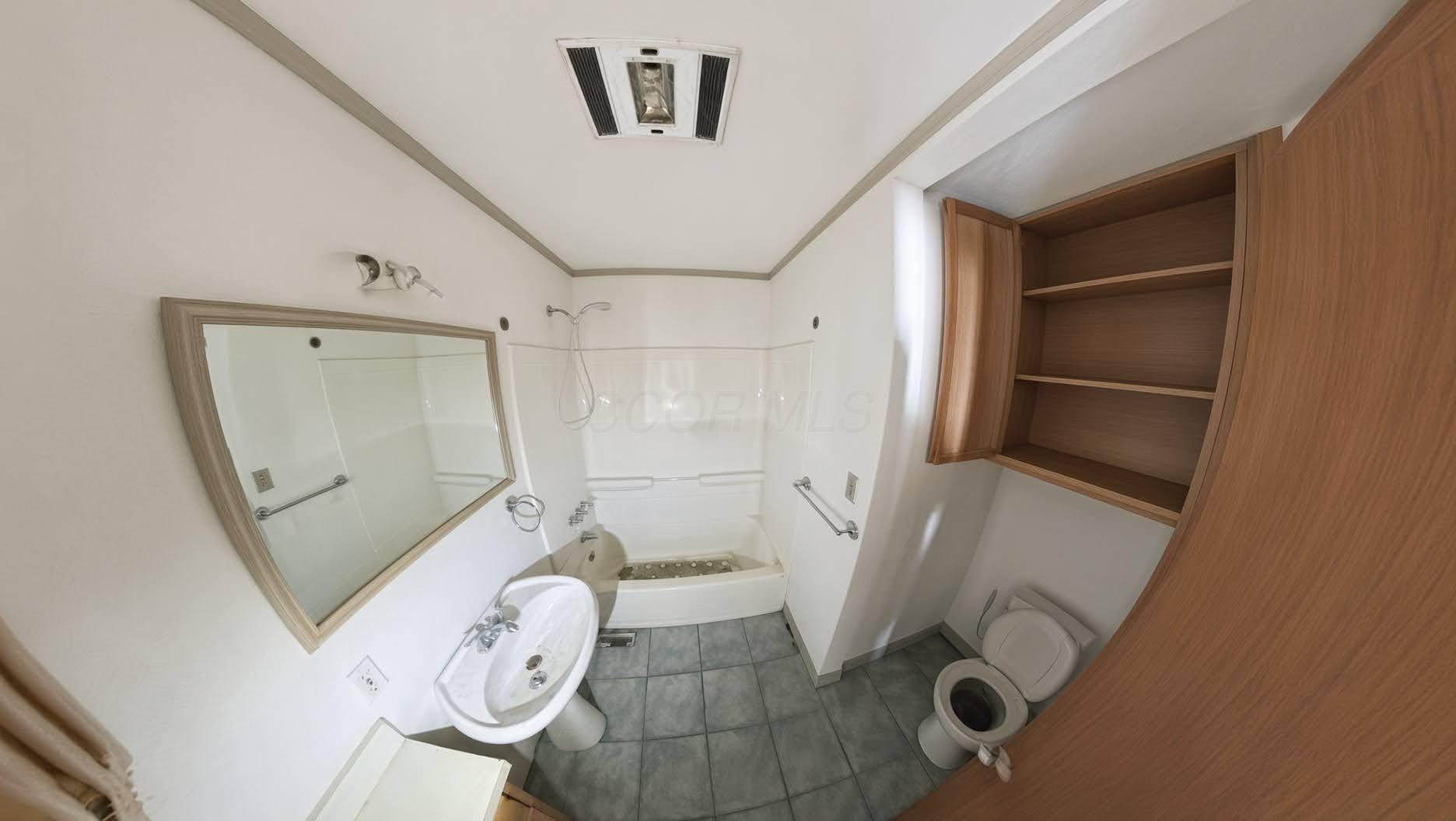 6045 Refugee Road Pickerington, OH 43147 - Photo 17 of 28 17 Hall bathroom with tub and shower