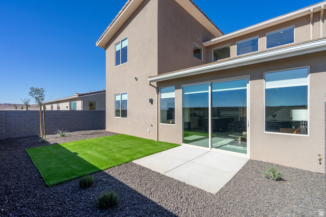 2972 West 570 North Hurricane, UT 84737 - Photo 88 of 104 Rear view of property featuring a patio area, stucco siding, and a fenced backyard