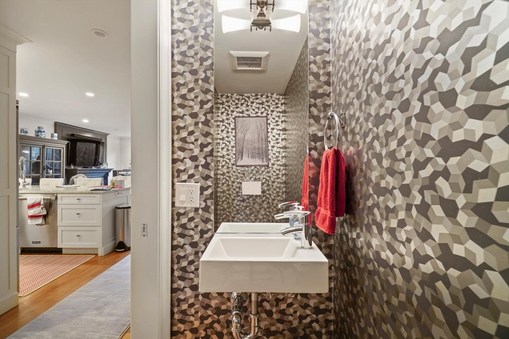 55 Dwight Street, Unit 1 Boston, MA 02118 - Photo 5 of 15 a bathroom with a sink and a mirror