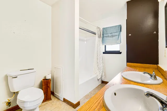 a bathroom with a sink and a toilet