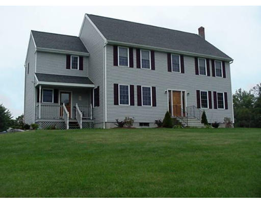 243 Thompson Road Princeton, MA 01541 - Photo 1 of 7 a front view of a house with a garden
