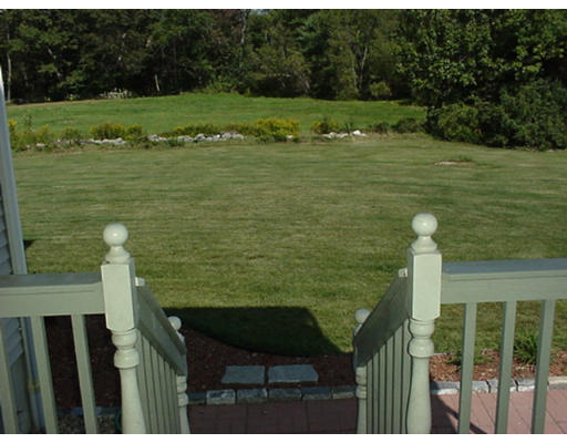 243 Thompson Road Princeton, MA 01541 - Photo 3 of 7 a view of a lake with a yard